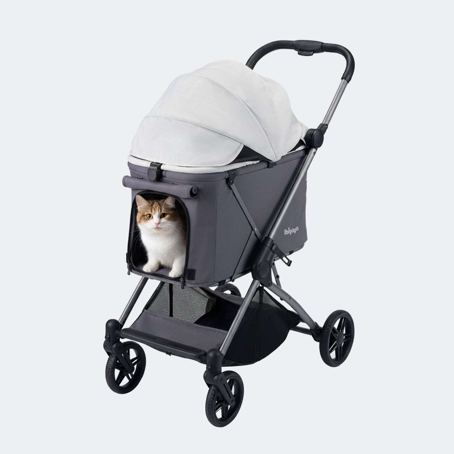 Ibiyaya Maxi pet stroller with a cat inside peeking out from the mesh window.