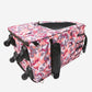 Bottom side view of the Petique dog carrier with four wheels exposed and the material that covers the wheels when not in use being put away inside a zippered enclosure.