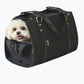Small dog inside the Petote Payton modern dog carrier bag.